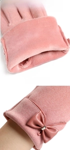 Pink winter gloves with warm crystal velvet lining and a faux leather bow detail