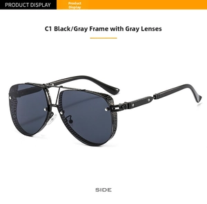 Detail view of aviator sunglasses featuring metal mesh side shields and black frame