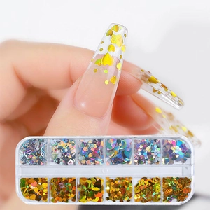 Detail of 12-grid nail art kit with holographic heart sequins and laser silver glitter