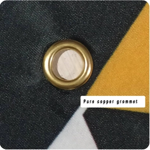 Detailed close-up of a pure copper grommet on Halloween holiday backdrop fabric