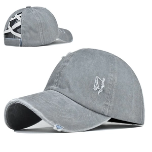 Detail of washed grey baseball cap featuring a criss-cross elastic ponytail opening