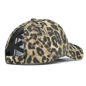 Detail view of the leopard print baseball cap with elastic criss-cross ponytail opening