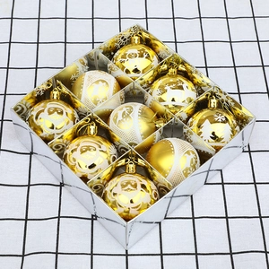 Set of 9 gold Christmas ball ornaments with festive patterns in silver gift box
