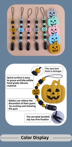 Detail showing pumpkin-shaped food-grade silicone baby pacifier clip chains in various colors