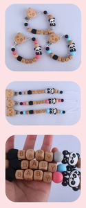 Three-piece baby pacifier clip set with wooden letter beads and silicone panda pendant