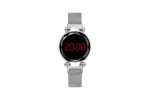 Close-up of digital watch with silver mesh band and multifaceted prism glass display