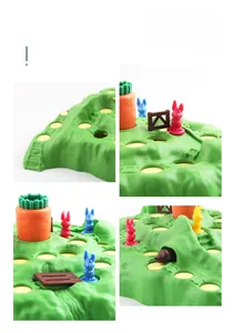Detail view of rabbit trap board game showing maze paths, traps, and carrot mechanics