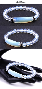 Macro view of blue-white moonstone bracelet beads with polished silver metal spacers