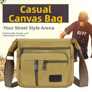 Detail view of khaki canvas shoulder bag with multi-pocket design and adjustable strap