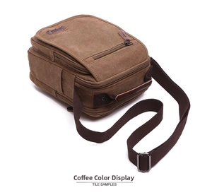 Macro shot of coffee brown canvas messenger bag with leather logo and multi-zipper pockets