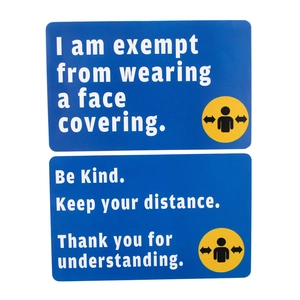 Detail of blue medical exemption badges with white text and social distance icons