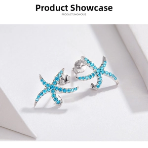 Detail shot of S925 sterling silver starfish stud earrings with blue cubic zirconia