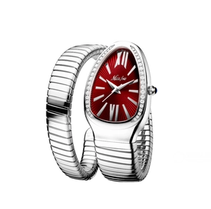 Macro shot of silver snake-head watch with red sunray dial and sparkling rhinestones