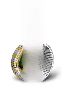 Detail of snakehead watch featuring green sunray dial and diamond-set bicolor bracelet