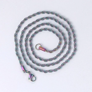 Macro shot of a 3mm rainbow stainless steel twisted rope chain necklace with lobster clasp