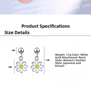Detail view of dainty daisy drop earrings with size specs: 17mm length and 8mm flower diameter
