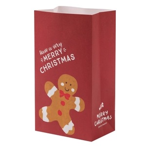 Christmas gift paper bags featuring gingerbread man prints and Merry Christmas greetings