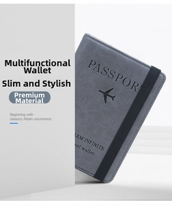 Detail of grey RFID passport holder with airplane embossment and elastic closure strap