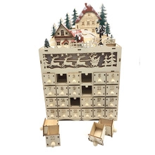 Detailed view of a wooden LED advent calendar with 24 small drawers for Christmas decor