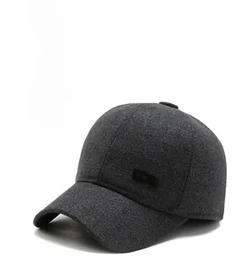Detailed close-up of dark grey wool blend baseball cap showing texture and Sport label