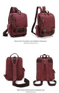 Dettagli dello zaino in tela bordeaux con cinturini in pelle e tasche laterali funzionali
