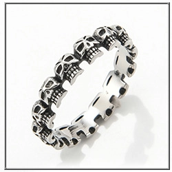 Detailed view of silver gothic skull ring with oxidized vintage steel finish