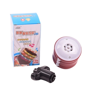 Electric music gyroscope toy set with light-up spinning top and launcher in box