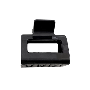 Glossy black square plastic hair claw clip for women on a clean white background