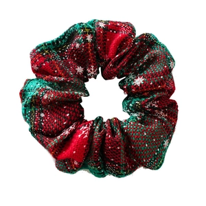 Christmas hair scrunchie with red and green plaid patterns and golden glitter details
