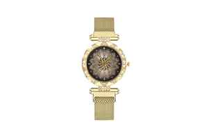 Detail of a luxury women's watch featuring a gold mesh magnetic band and rhinestone bezel