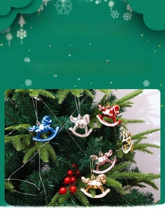 Close-up of vibrant electroplated rocking horse ornaments hanging on a Christmas tree branch