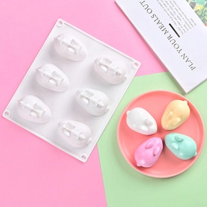 Close-up of food-grade 6-cavity rabbit silicone ice cream mold with colorful finished popsicles