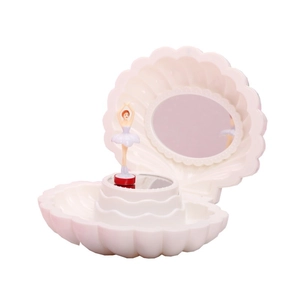 Shell musical jewelry box with rotating ballerina and mirror in soft pink and white