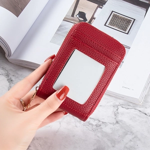 Red lychee grain leather card holder with gold zipper and multi-slot design