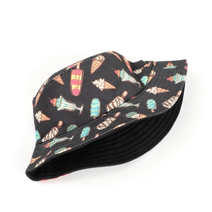 Detail shot of black bucket hat with colorful ice cream prints on cotton fabric