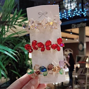 Three-piece Korean butterfly hair clips set with colorful rhinestones on white card