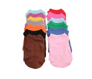 Flat lay view of multi-color cotton dog vests in pink, blue, yellow and other bright hues