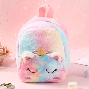 Detail of plush unicorn backpack featuring rainbow gradient faux fur and gold glitter horn