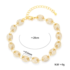 Detailed view of gold plated coffee bean chain with zircon pave and size measurements