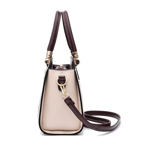 Contrast leather tote bag in beige and brown with golden hardware and long strap
