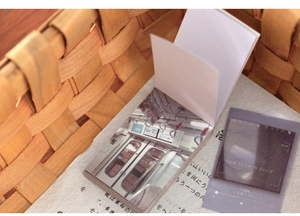 Macro detail of aesthetic journaling stickers featuring scenery and music player card