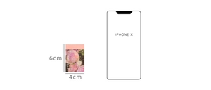 Detailed size comparison of pink floral sticker measuring 6cm by 4cm next to an iPhone X