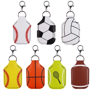 Set of 7 sports themed leather keychain holders for hand sanitizer featuring ball designs
