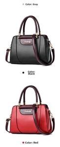 Detailed view of large-capacity handbags in grey, black, and red synthetic leather