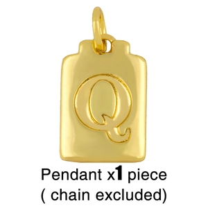 Detailed close-up of a gold letter Q pendant featuring a textured hip-hop 3D design
