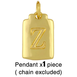 Detailed view of golden rectangle pendant with letter Z engraving, chain excluded