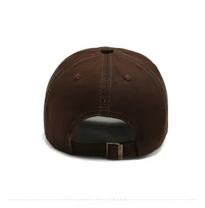 Rear view of dark brown baseball cap featuring adjustable metal buckle and cotton canvas