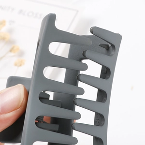 Matte grey rectangular hair claw clip for women, minimalist daily hair styling accessory.