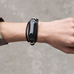 Ethnic retro black braided leather strap with silver frame for Xiaomi smart band on wrist