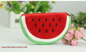 Detail of plush watermelon coin purse with red embroidery and metal keychain ball chain